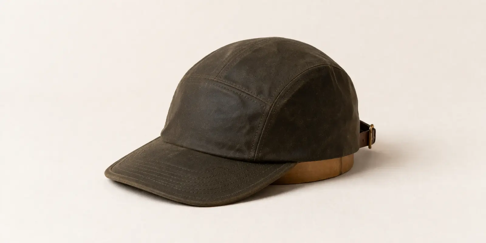 Motor City Cap — waxed cotton, unstructured crown, leather strap closure
