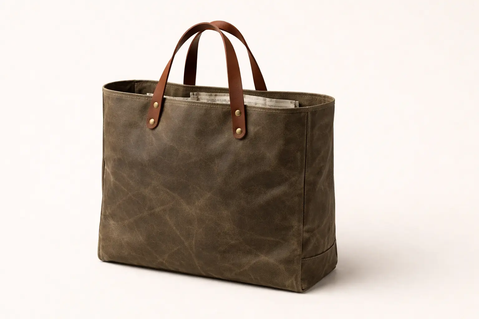 Foundry Tote — waxed canvas body, Horween leather handles, brass rivets